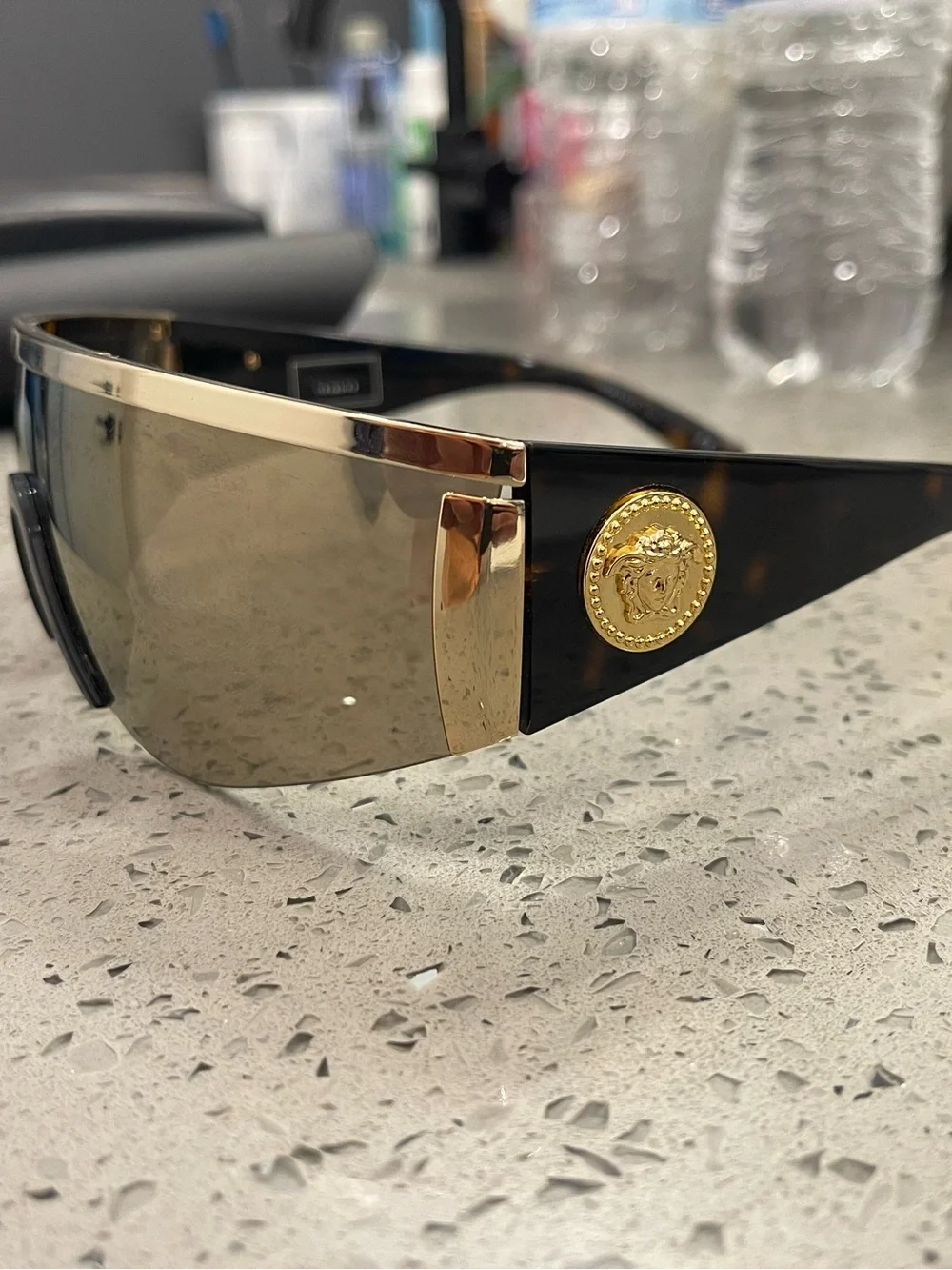 Versace Gold-Tinted Shield Sunglasses with Black Temples